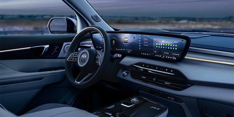 Interior of a modern car with a large touchscreen on the dashboard